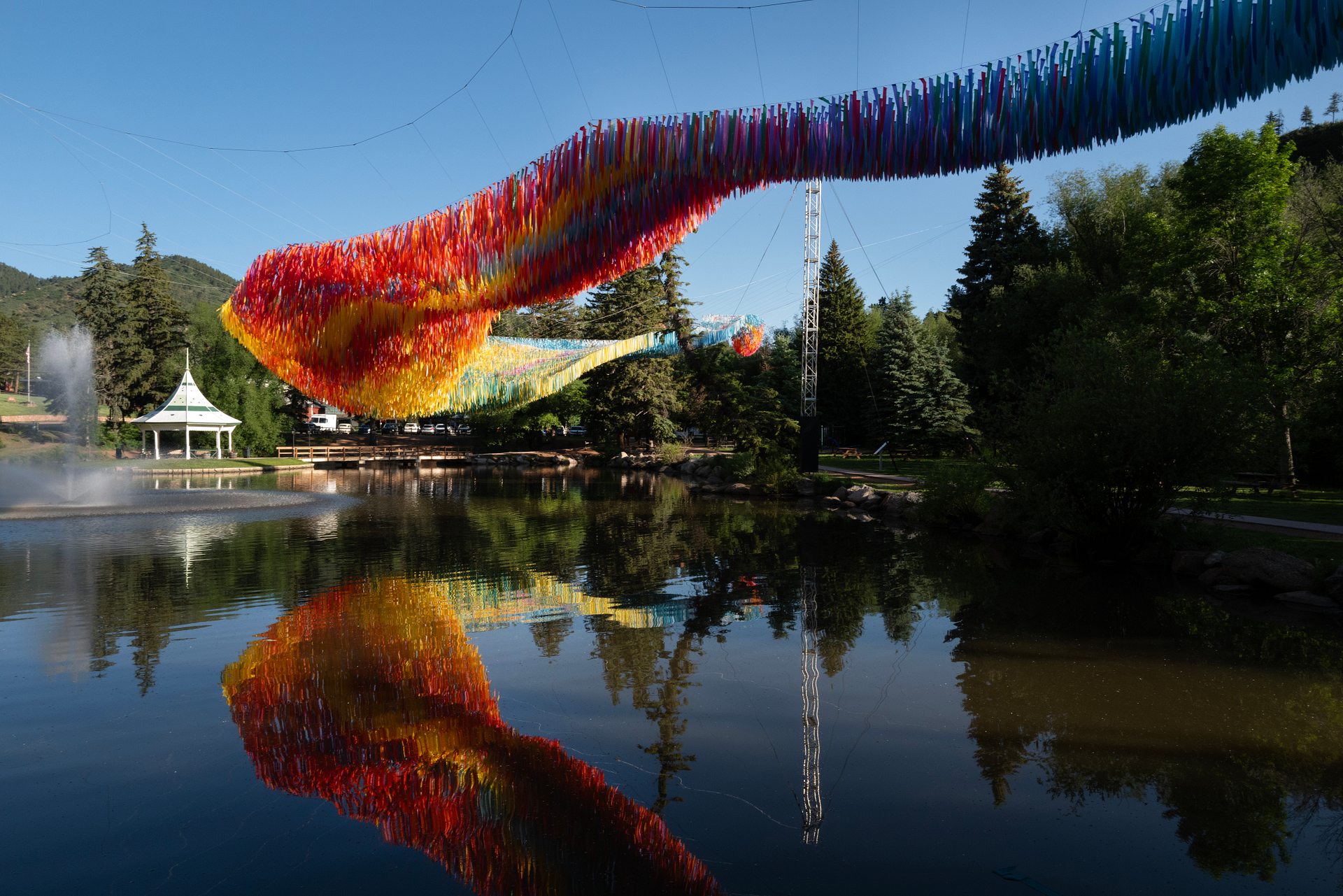 Off the Beaten Path by Patrick Shearn of Poetic Kinetics on display over Gazebo Lake. Photo by Jeff Kearney.
