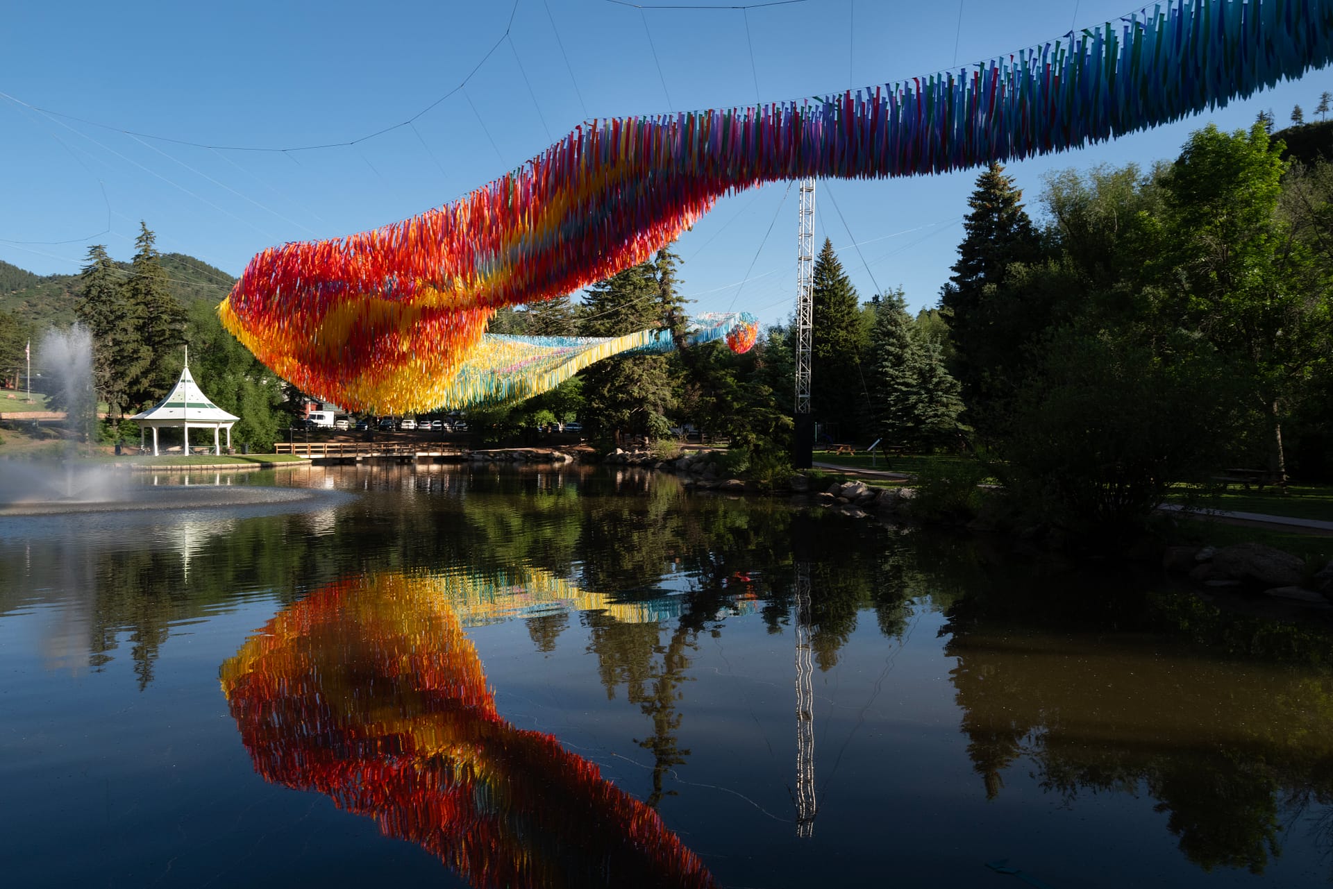 Off the Beaten Path by Patrick Shearn of Poetic Kinetics on display over Gazebo Lake. Photo by Jeff Kearney.